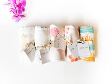 Load image into Gallery viewer, Coca + B. - Seashell Print Organic Bamboo Swaddle
