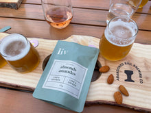 Load image into Gallery viewer, Liv Artisanal - Lime &amp; Saffron Almonds (57g)
